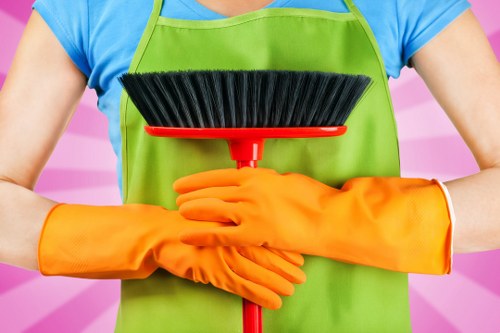 Cleaning team handling waste and residues in a compliant way